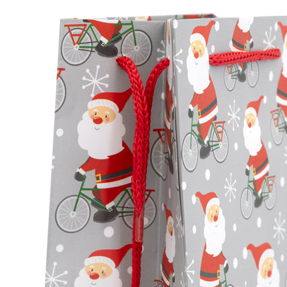 Idena Flaschentasche Weihnachtsmann auf Fahrrad 12x35x9cm FSC-Mix